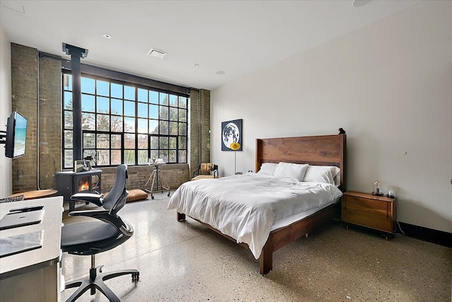 bedroom with a wood stove