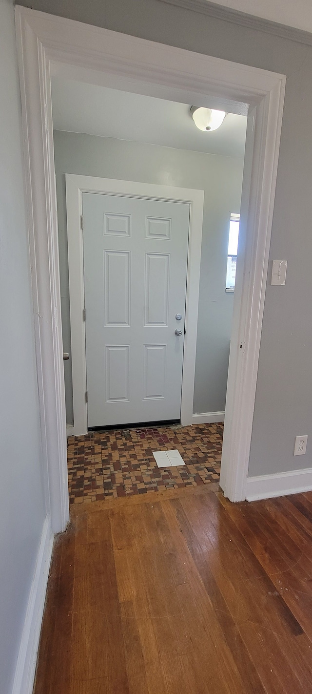 interior space with dark wood-type flooring