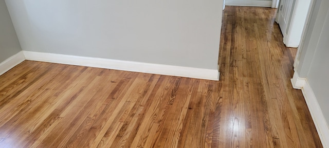 interior details featuring hardwood / wood-style floors