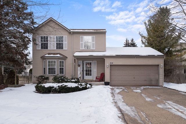 view of front of property featuring a garage