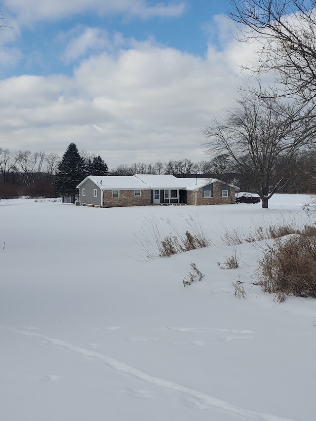 view of yard covered in snow