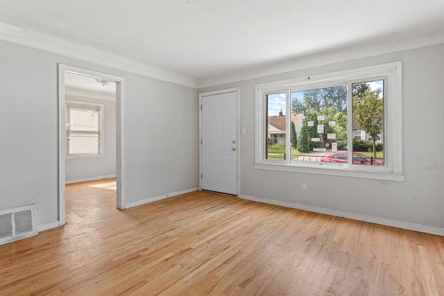 unfurnished room featuring light hardwood / wood-style floors