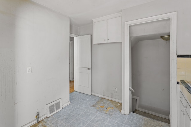 kitchen with white cabinetry