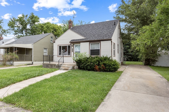 bungalow with a front lawn