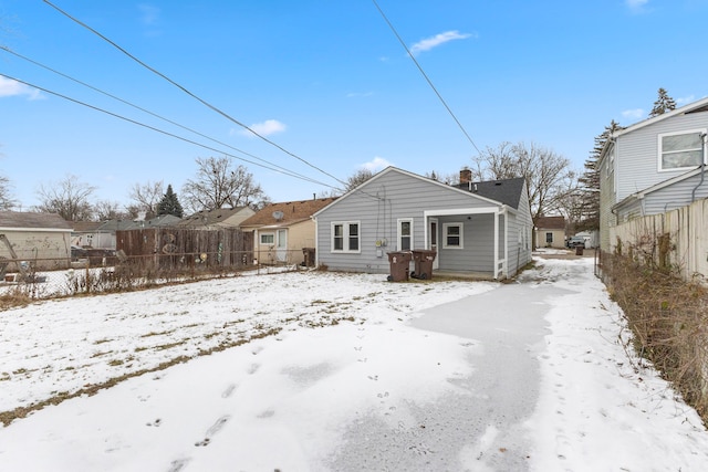 view of snow covered property