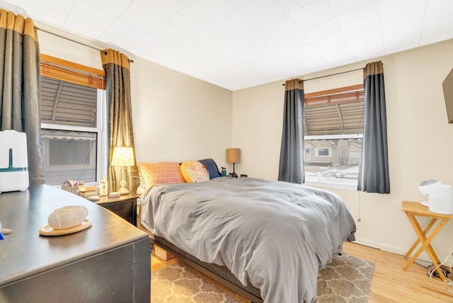 bedroom featuring light wood-type flooring