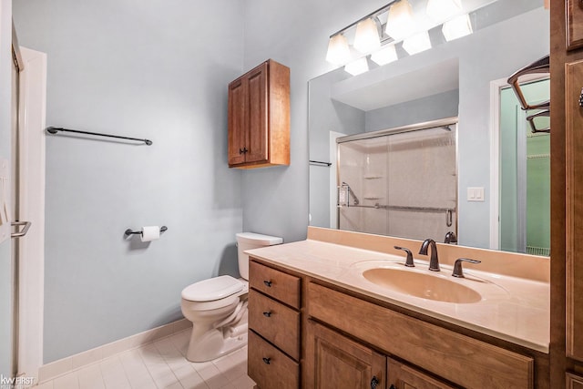 bathroom with a shower with shower door, toilet, and vanity