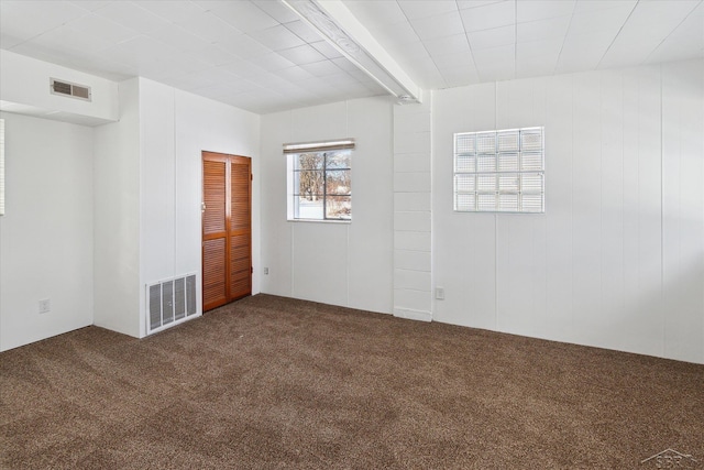 view of carpeted spare room