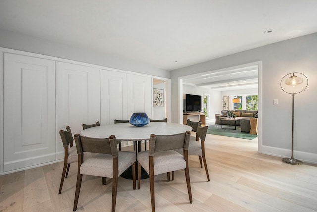 dining room with light hardwood / wood-style floors