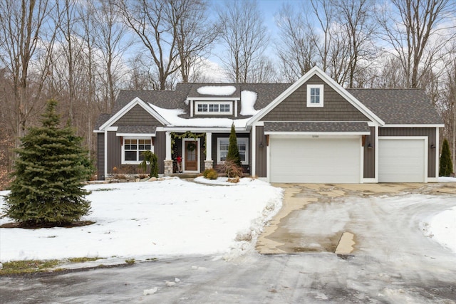 craftsman inspired home with a garage