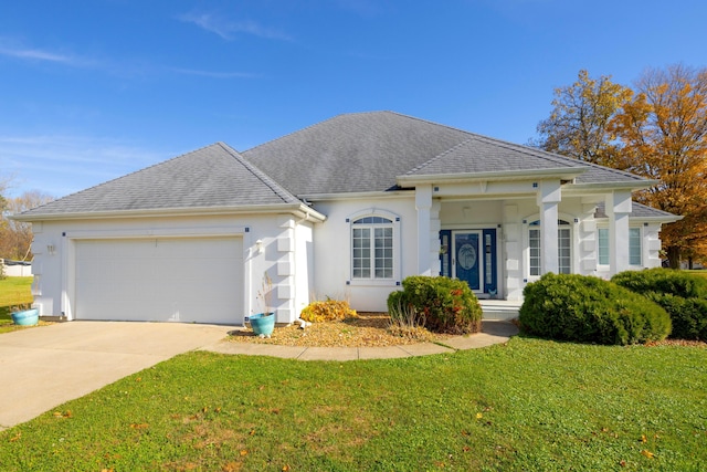 4549 Forest Beach Rd, Watervliet, MI 49098 - view of front of property with a garage and a front yard