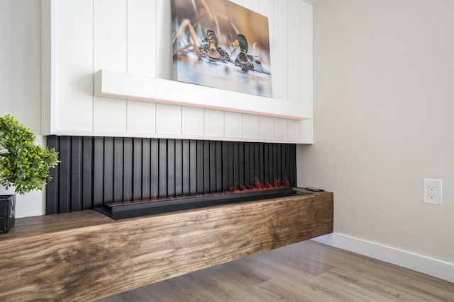 interior details with hardwood / wood-style flooring