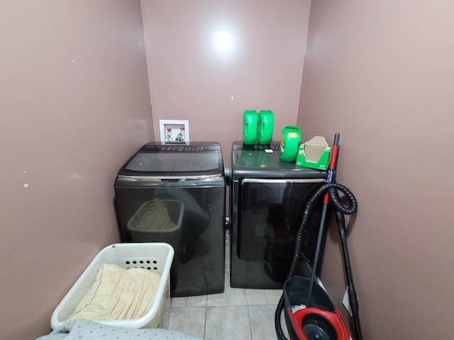 clothes washing area featuring washing machine and clothes dryer