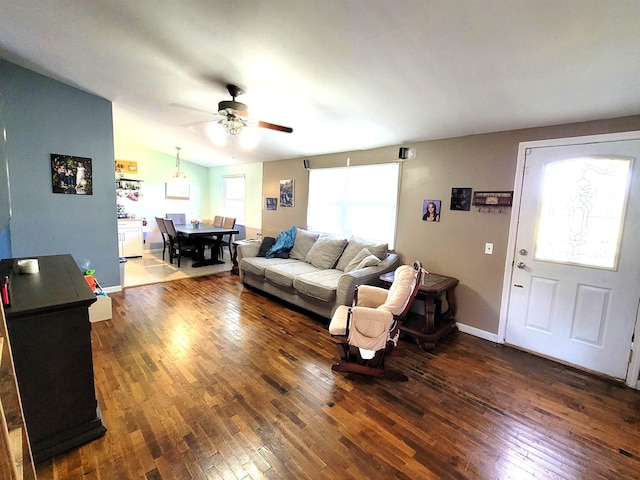 7412 N Webster Rd, Mount Morris, MI 48458 - living room with lofted ceiling, ceiling fan, hardwood / wood-style floors, and baseboards
