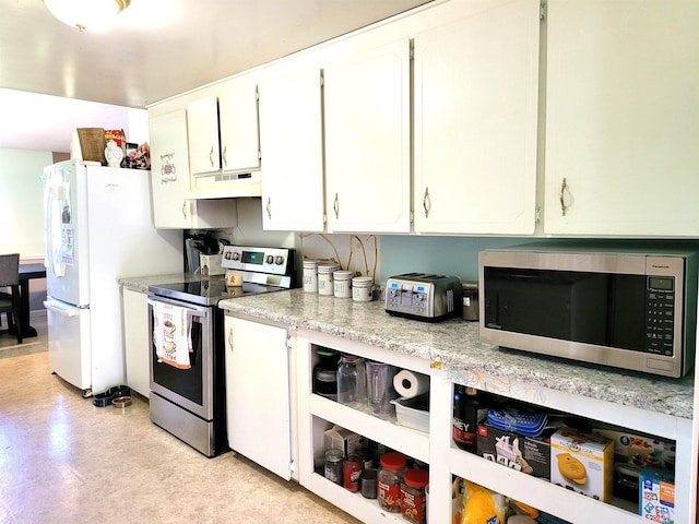 7412 N Webster Rd, Mount Morris, MI 48458 - kitchen with under cabinet range hood, white cabinets, appliances with stainless steel finishes, and light countertops