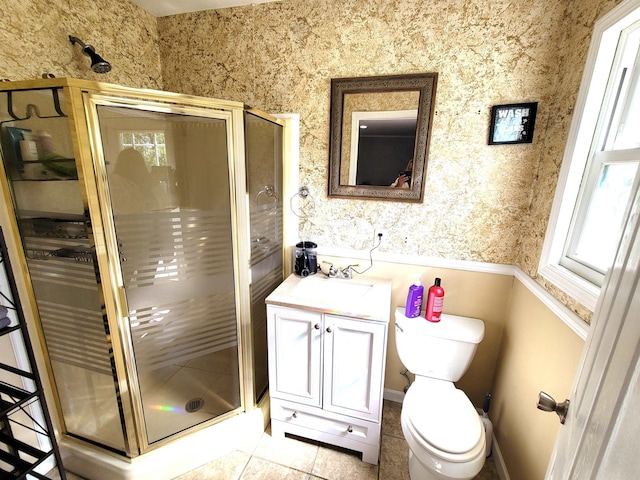 bathroom featuring an enclosed shower, toilet, tile patterned floors, and vanity