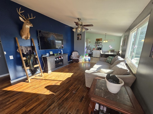 7412 N Webster Rd, Mount Morris, MI 48458 - living area featuring hardwood / wood-style flooring, ceiling fan, a fireplace, and lofted ceiling