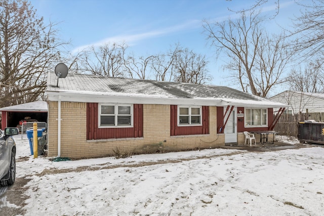 view of front of home featuring a carport