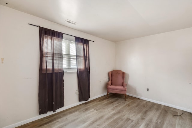 unfurnished room featuring light wood-type flooring