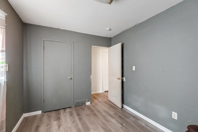 unfurnished bedroom featuring light hardwood / wood-style flooring