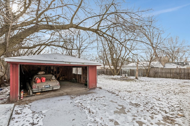 view of snow covered garage