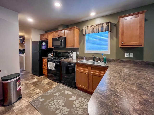 kitchen with sink and black appliances