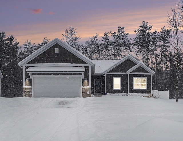 view of front of home featuring a garage