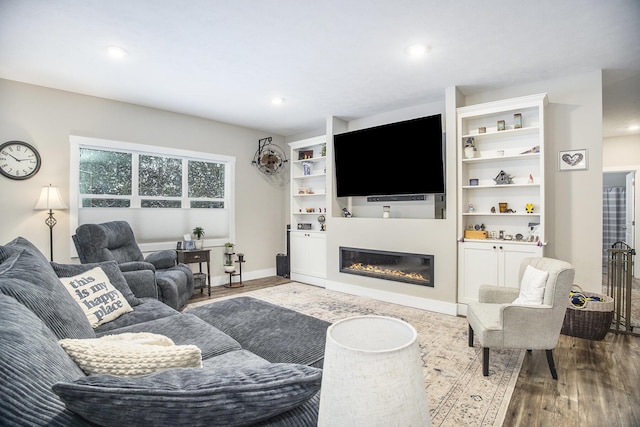 living room with hardwood / wood-style flooring