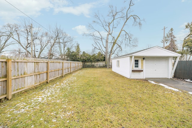 view of yard featuring an outbuilding and a garage