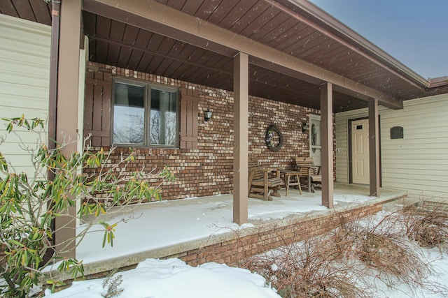 view of snow covered patio