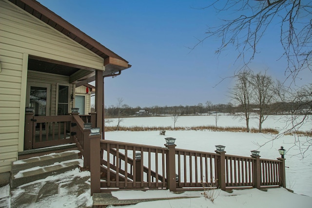 view of snow covered deck