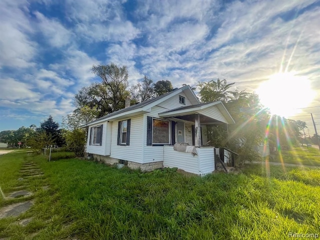 view of property exterior featuring a yard