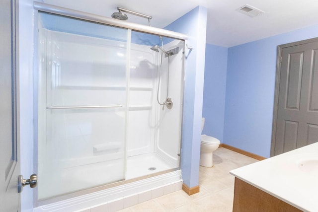 bathroom with vanity, toilet, and walk in shower