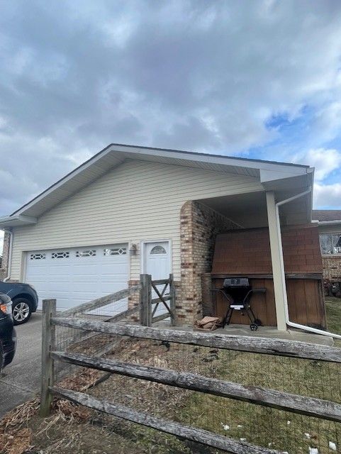 view of home's exterior featuring a garage