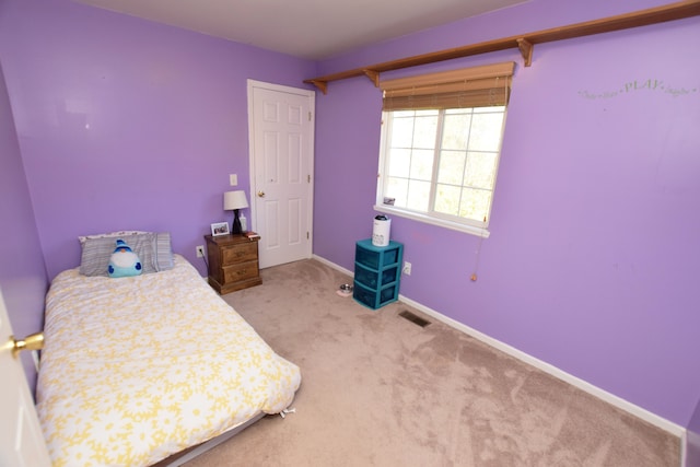 unfurnished bedroom with light carpet