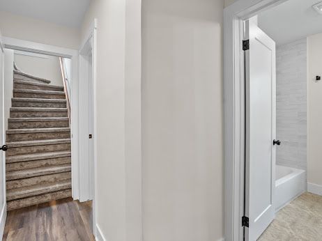 hallway featuring hardwood / wood-style floors