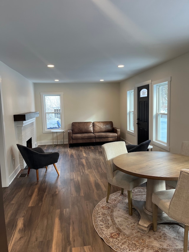 dining area featuring dark hardwood / wood-style floors