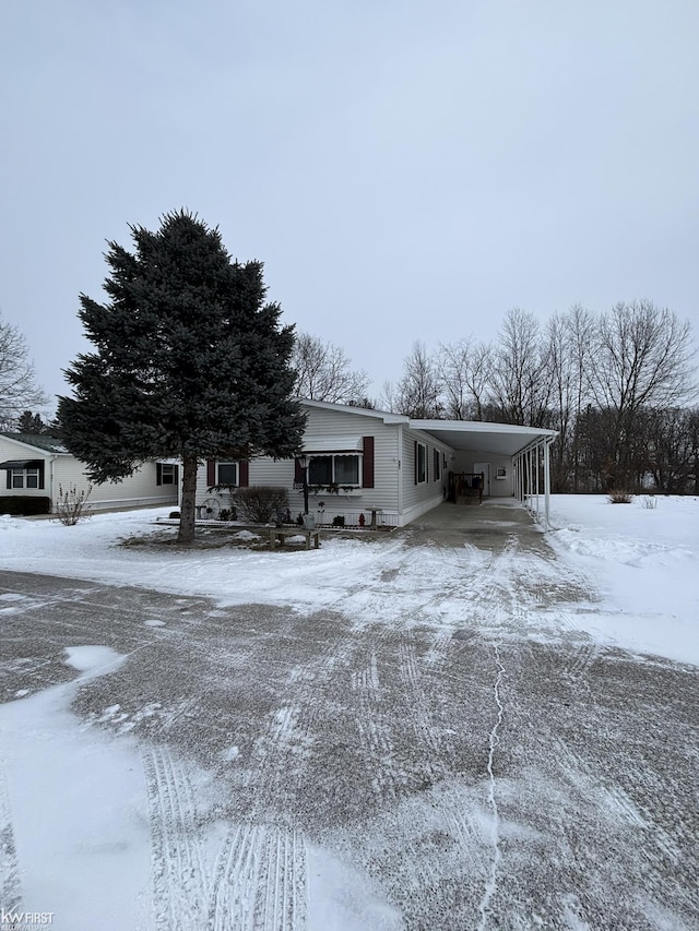 view of front of house with a carport