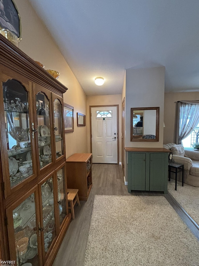 foyer entrance with lofted ceiling