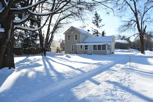 view of snow covered property