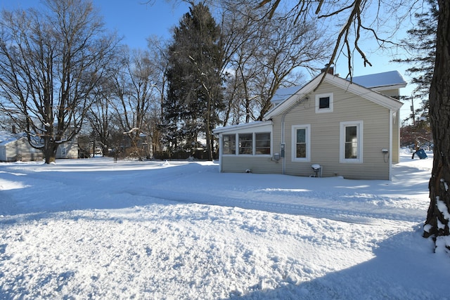 view of snow covered house