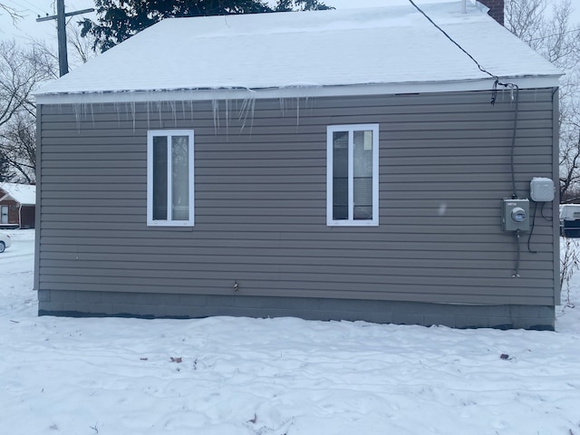 view of snow covered property