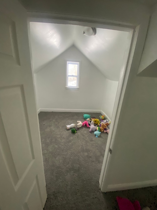 game room featuring vaulted ceiling and carpet floors