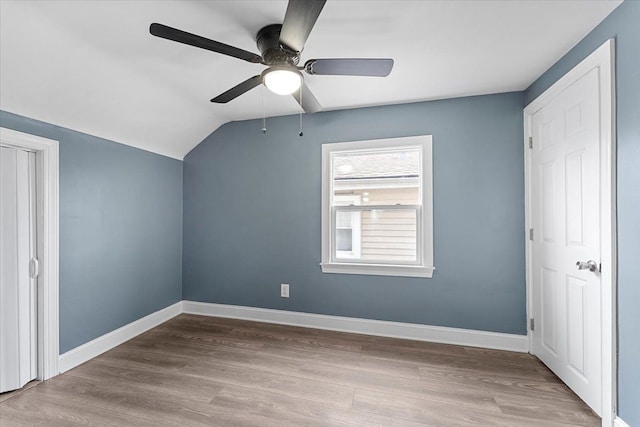 additional living space with ceiling fan, light hardwood / wood-style floors, and lofted ceiling