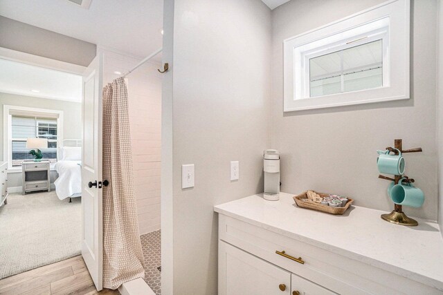 108 Elkenburg St Unit 18, South Haven, MI 49090 - bathroom featuring a shower with shower curtain