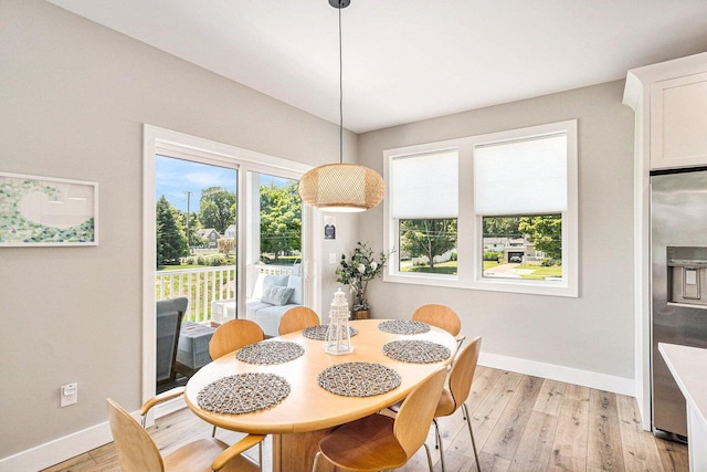 108 Elkenburg St Unit 18, South Haven, MI 49090 - dining space featuring light hardwood / wood-style flooring