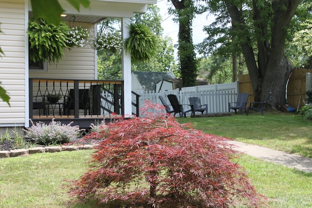 view of yard with a deck