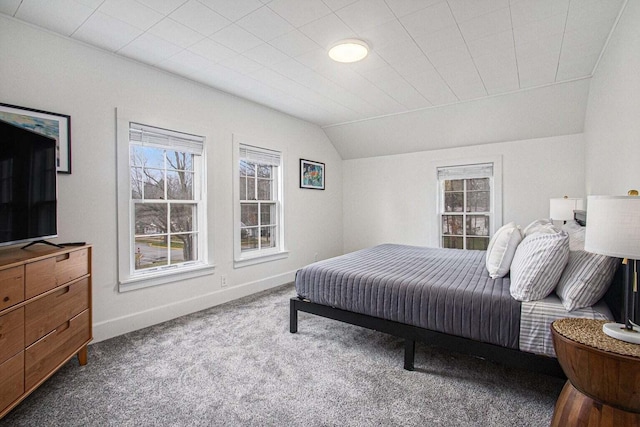 bedroom featuring carpet and lofted ceiling