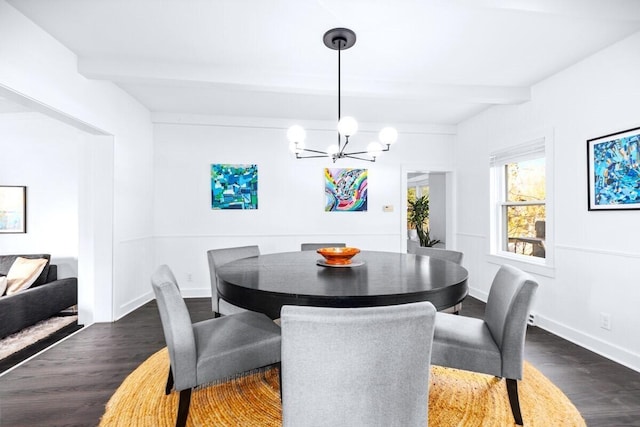 dining space featuring dark wood-type flooring, beam ceiling, and an inviting chandelier