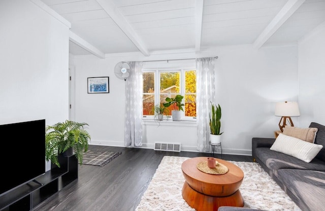 living room with dark wood-type flooring, beamed ceiling, and wood ceiling